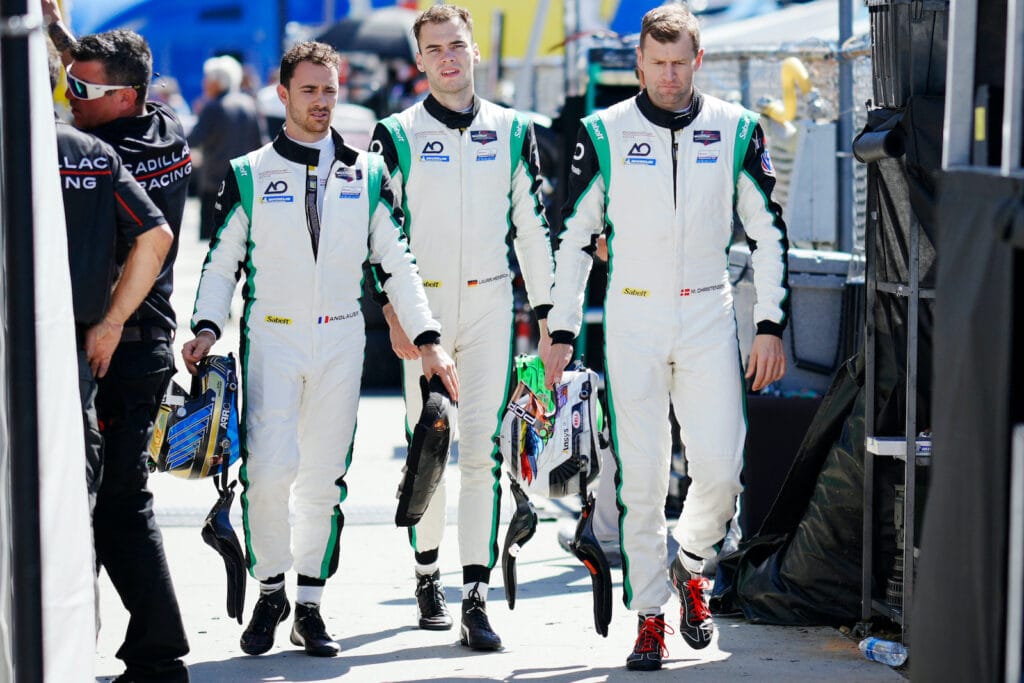 (L to R) Laurin Heinrich, Michael Christensen, Julien Andlauer will pilot the #77 'Rexy' Porsche 911 GT3.R in tomorrow's final IMSA race