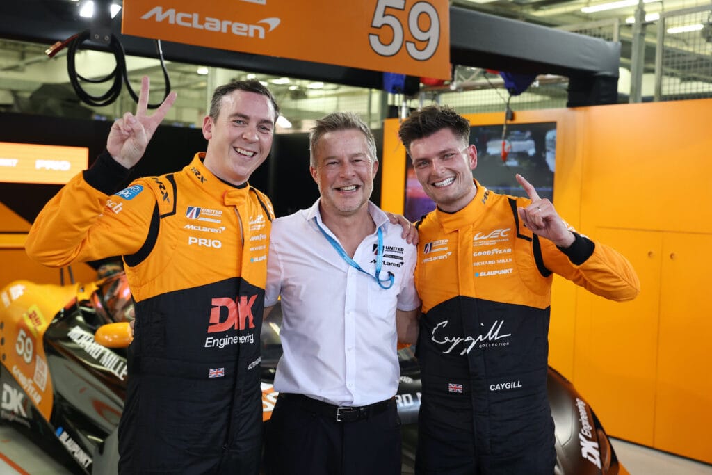 James Cottingham (L) and Josh Caygill (R) celebrated the first LMGT3 front-row knockout with CEO Richard Dean (centre)