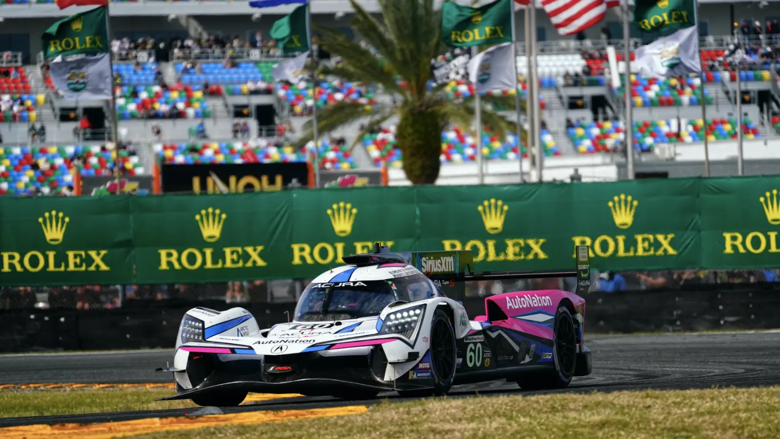 A pink Meyer Shank Racing Acura at the 2023 Daytona 24 Hours